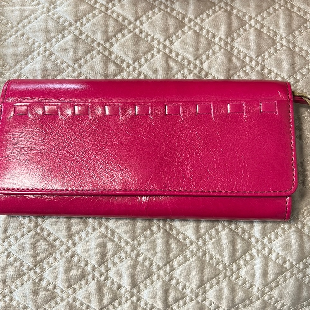 Brand new, never used hobo wallet, in raspberry leather